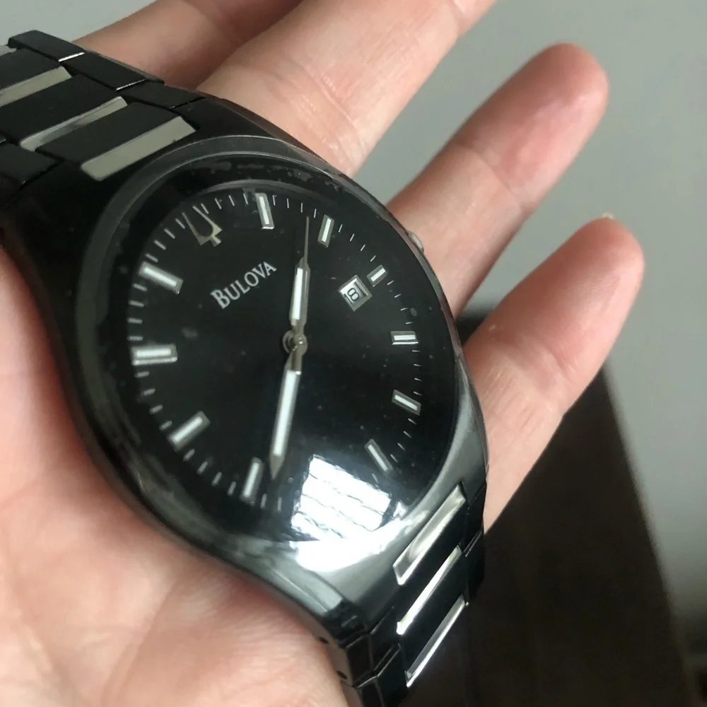 Bulova black watch.